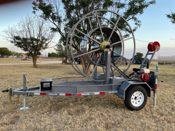 A large wheel trailer with a fire hydrant on the side.