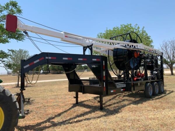 A large trailer with a crane attached to it.