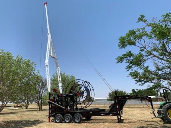 A crane is being used to lift a large object.