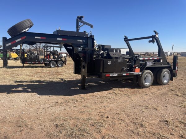 A black dump truck with a crane on the back.