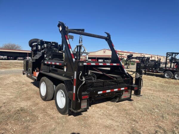 A dump truck with a trailer attached to it.