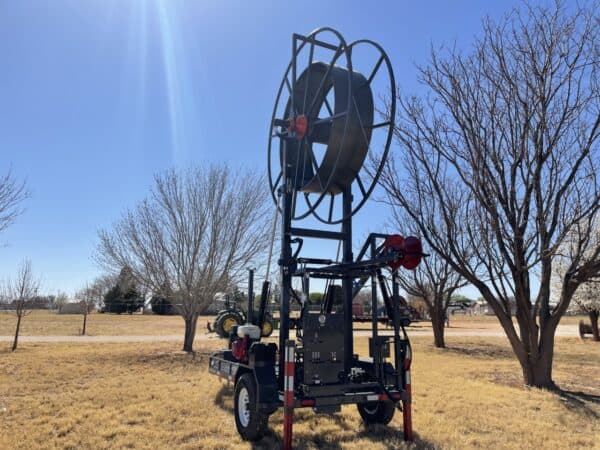 A tractor with a large number on it in the middle of nowhere.