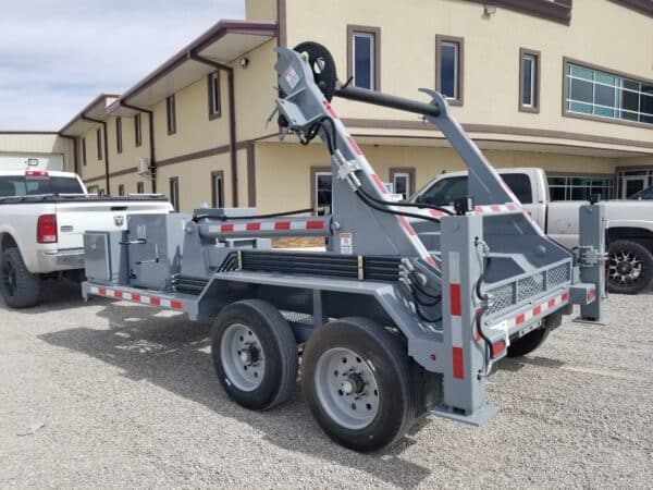 A large trailer with a crane attached to it.