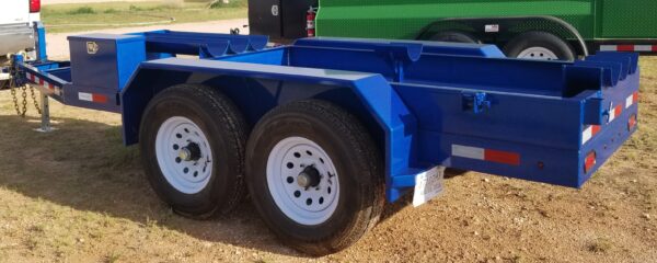 A blue trailer with two tires on it