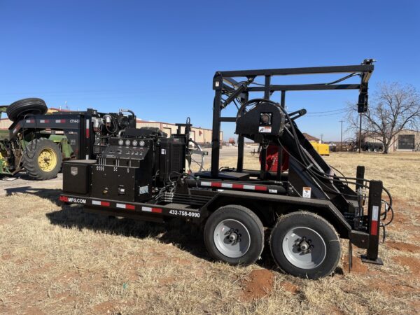 A large trailer with a crane on it