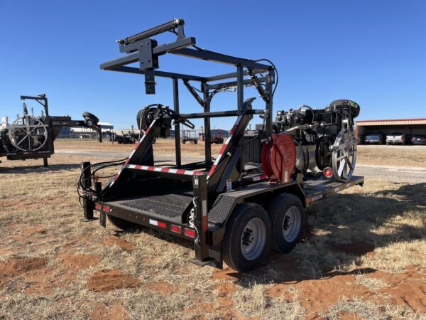 A trailer with a crane attached to it.