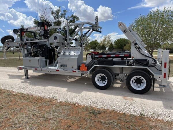 A large truck with a crane on the back