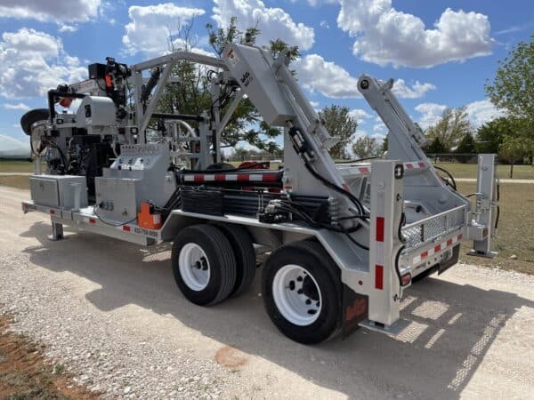 A large truck with a crane on the back