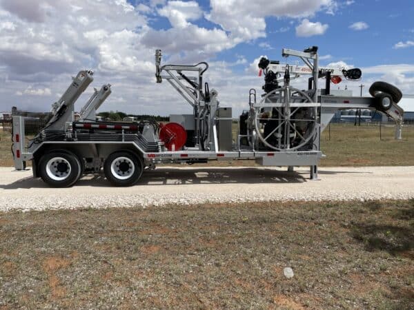 A large truck with a crane on the back