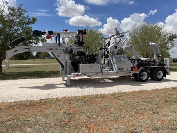 A large truck with a trailer attached to it