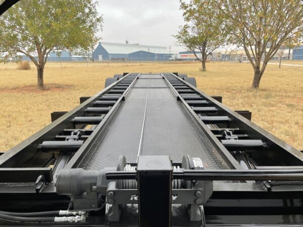 A train track with trees in the background