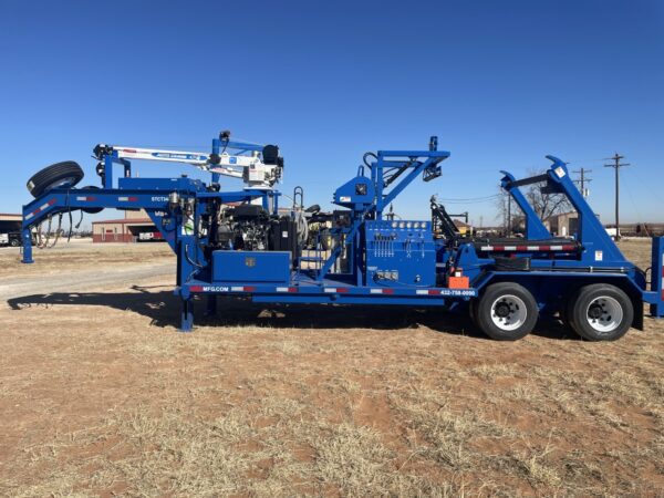 A blue truck with a crane on the back