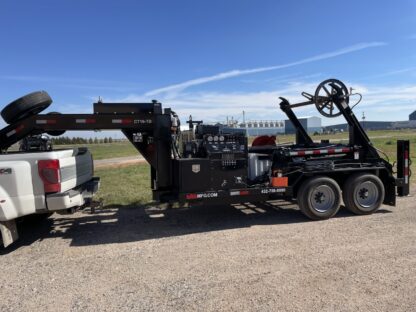 A large truck with a crane on the back