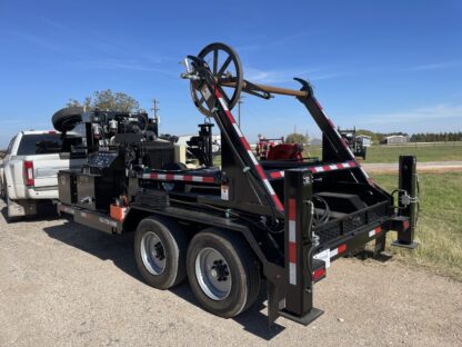 A tow truck with a crane on the back