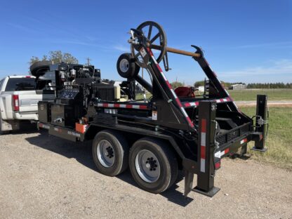 A tow truck with a large crane on the back.