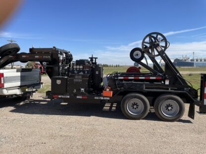 A large truck with a trailer attached to it.