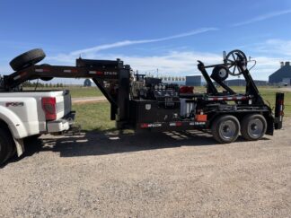 A large truck with a crane on the back