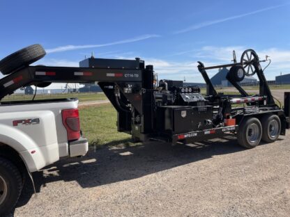 A truck with a crane attached to it