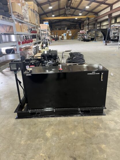 A black box sitting in the middle of a warehouse.