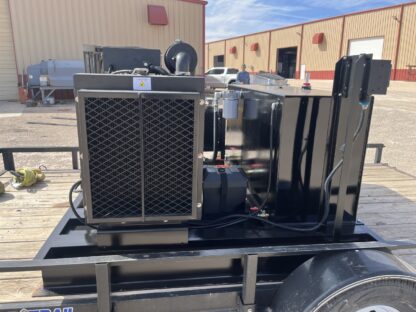 A large trailer with two air conditioning units on it.