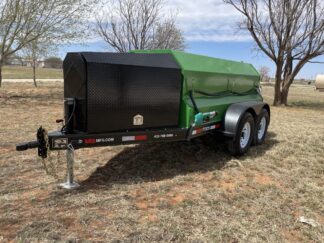 A green trailer with a black tank on it