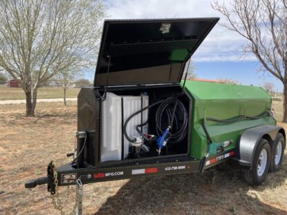 A green trailer with a gas tank and hose attached to it.